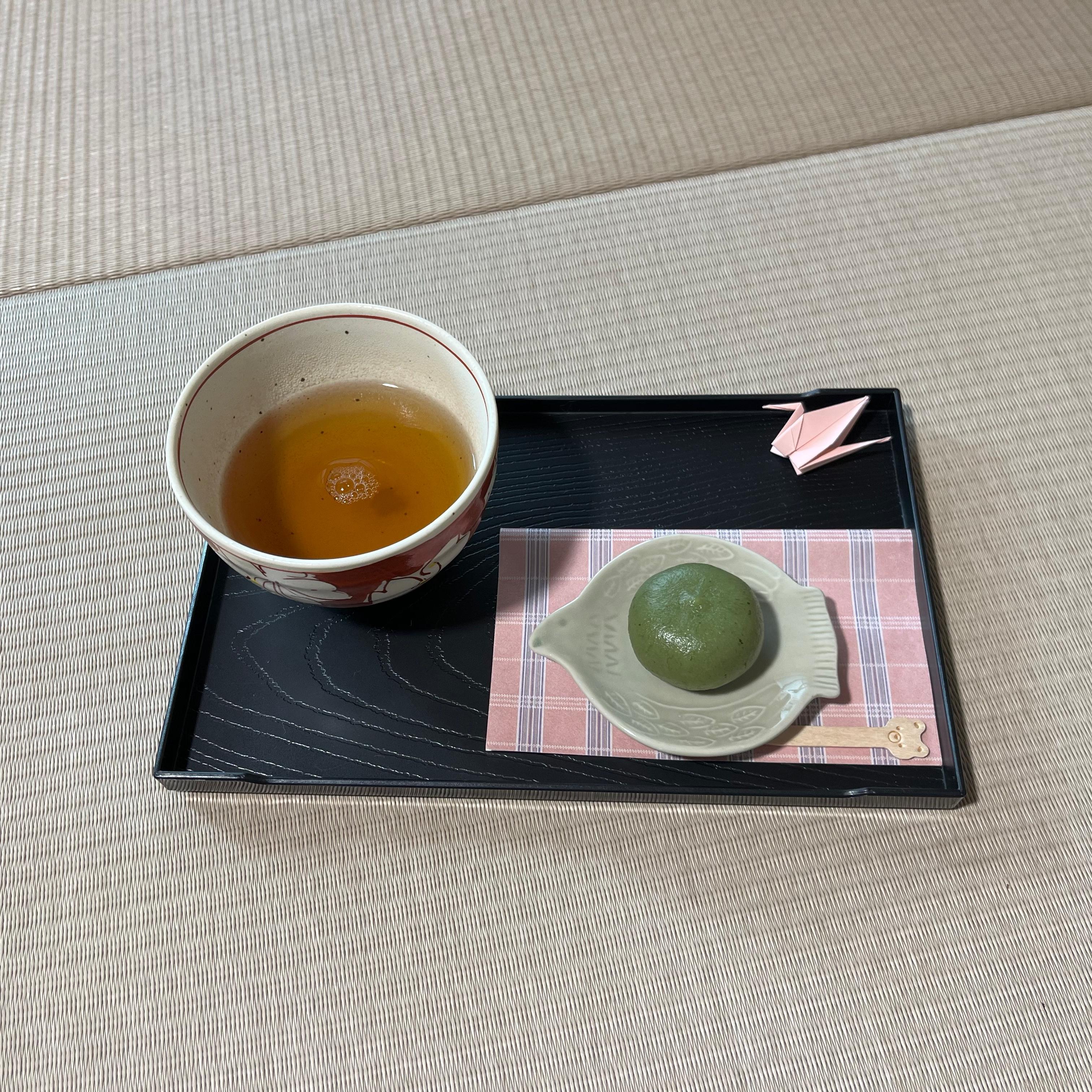 Japanese tea and wagashi served after a Reiki session in a traditional tatami room